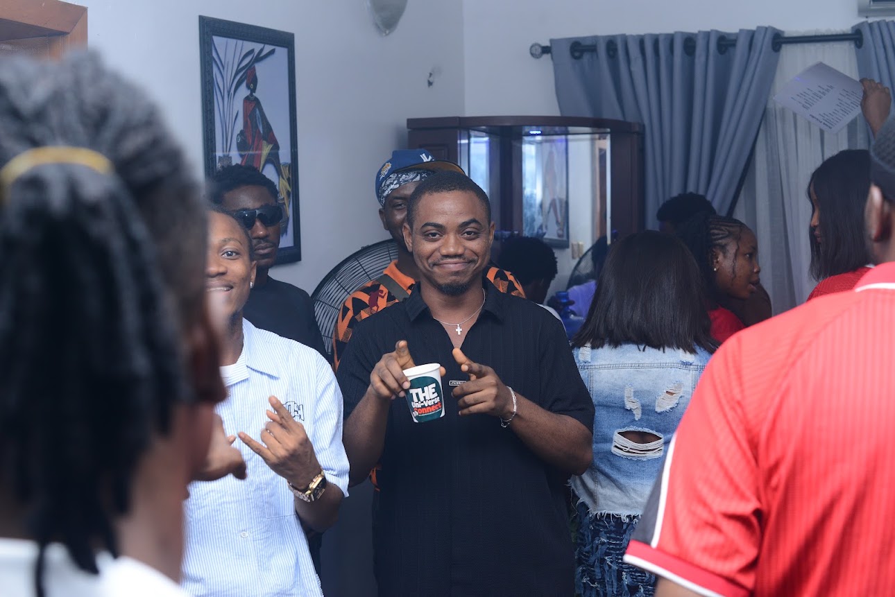 A guest smiling at a FRAANATION event